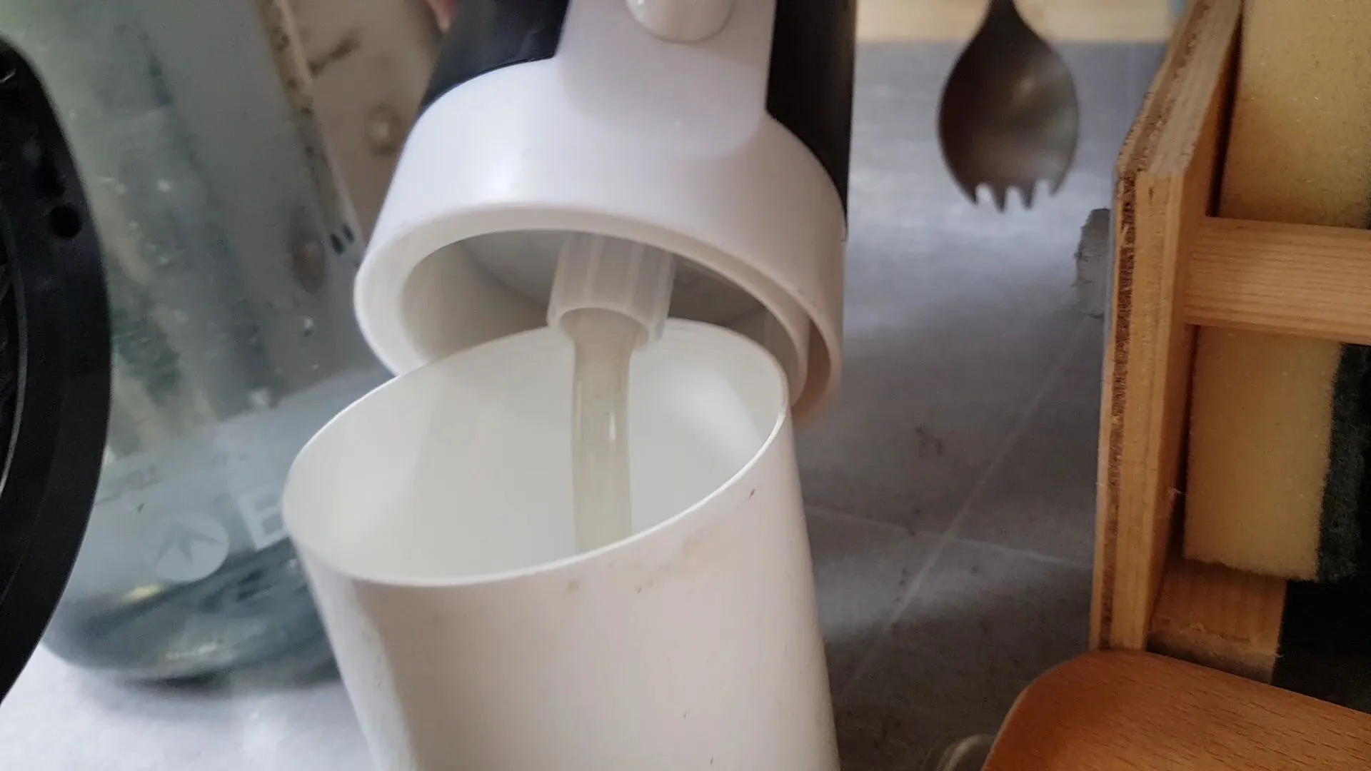 underside of a usb powered water tap mounted onto an aerosol can lid